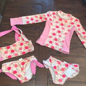 2 swimsuits, one with tags and one without